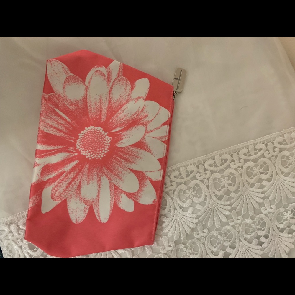 Orange with flower cosmetic case.